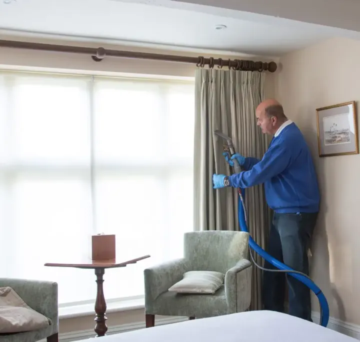 Peter Cleaning Curtains
