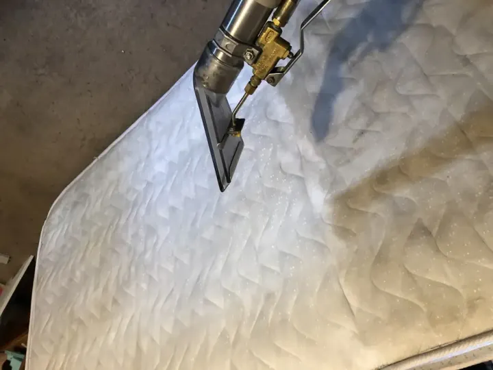 Mattress being cleaned